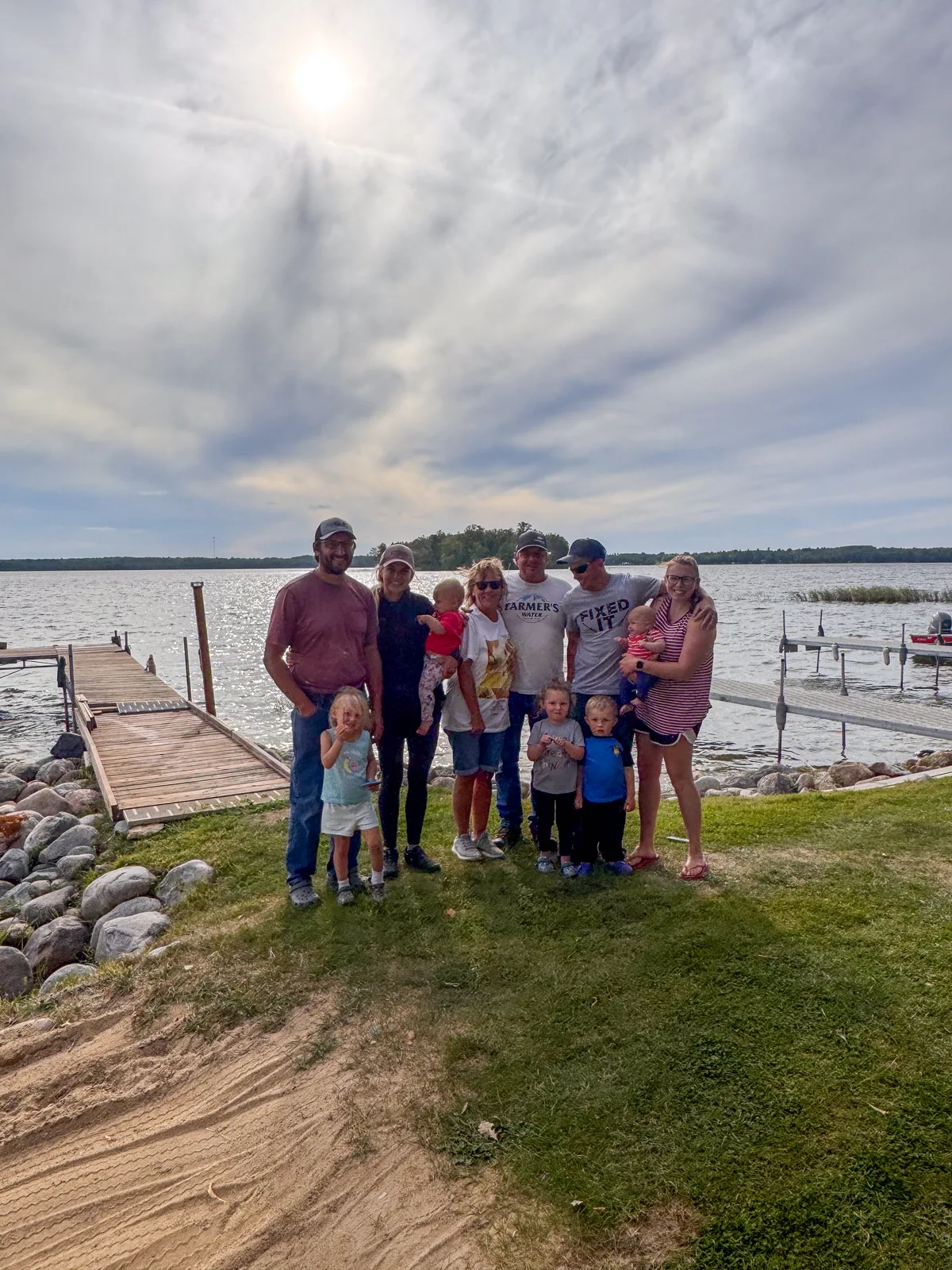Family vacation photo by the docks at Kohl’s Resort on Big Turtle Lake in northern Minnesota